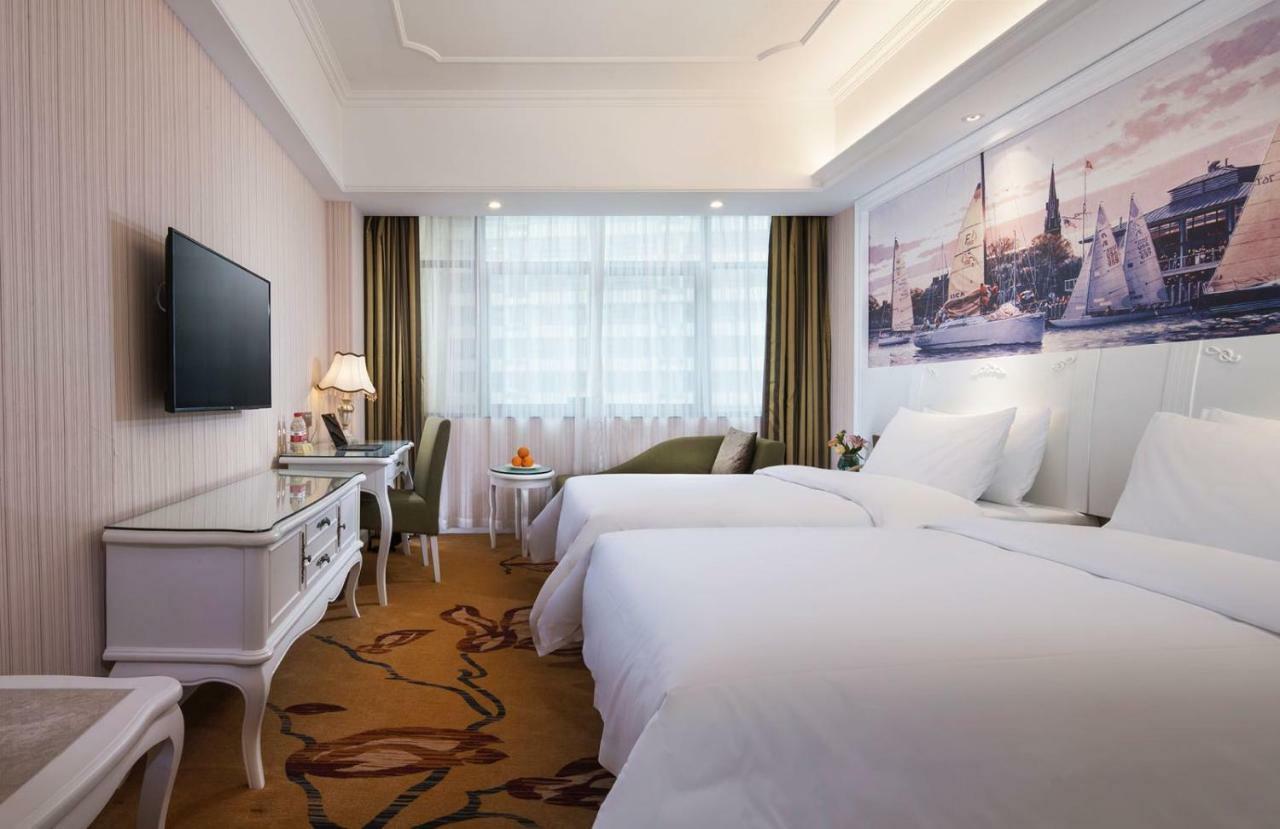 Vienna International Hotel Fenghua Zhongshan Road Exterior foto